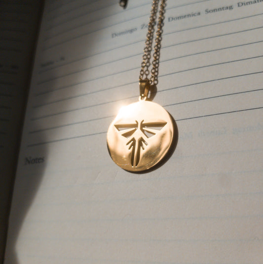 The Last of Us Stainless Steel Firefly Necklace - Gold Available at 2Fast2See.co