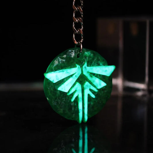 The Last Of Us Glowing Firefly Keychain - Available at 2Fast2See.co