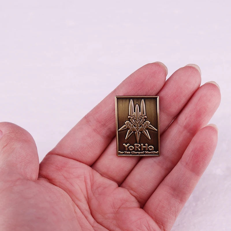 NieRs for the Glory of Mankind YoRHa Enamel Pin Vintage Brooch - NieRs for the Glory of Mankind YoRHa Logo Badge Vintage Brooch Available at 2Fast2See.co