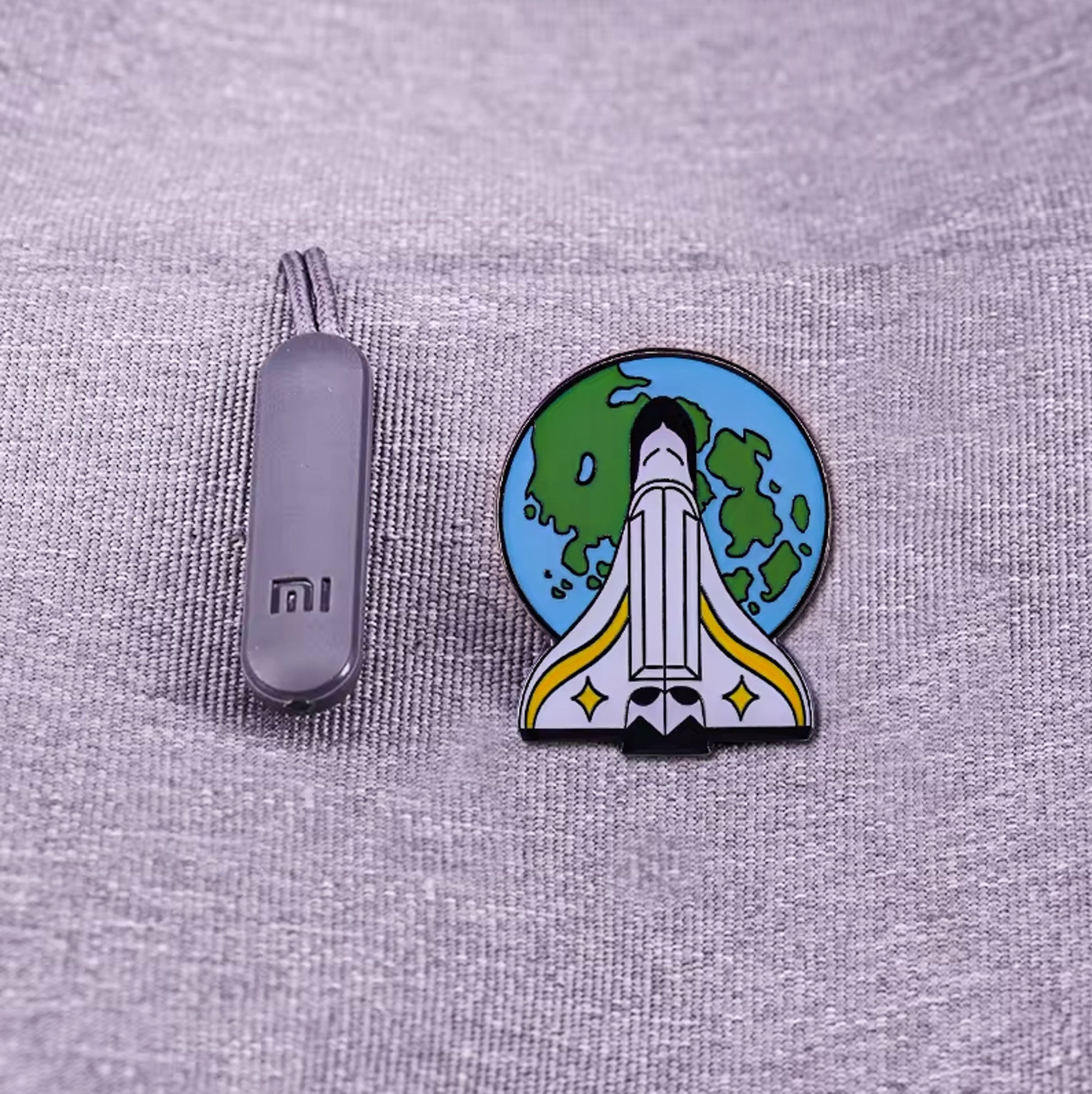 The Last of Us Part 2 Ellie's Space Rocket Pin Welcome To Earth - Replica Brooch - Default Title Available at 2Fast2See.co
