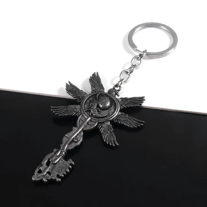 Resident Evil 8 RE8 Village Six-Winged Unborn Silver Key Keychain - Available at 2Fast2See.co