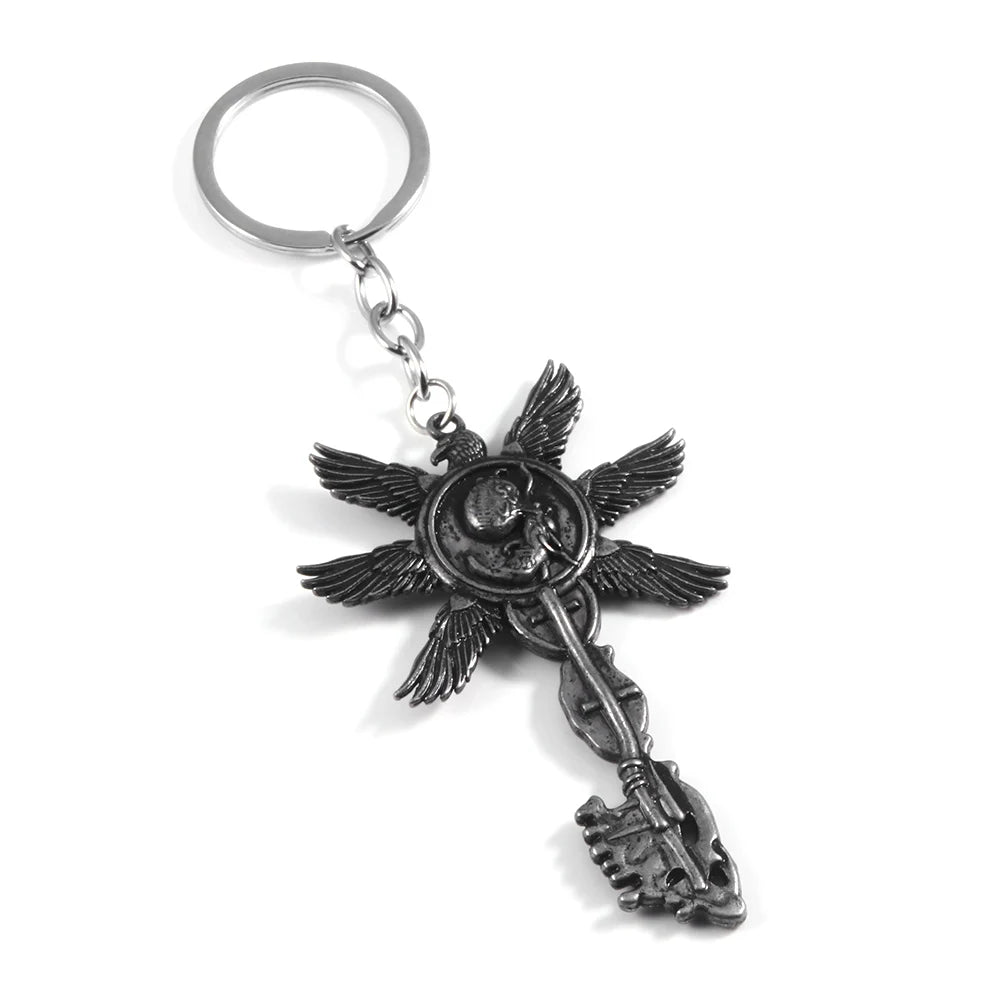 Resident Evil 8 RE8 Village Six-Winged Unborn Silver Key Keychain - Available at 2Fast2See.co