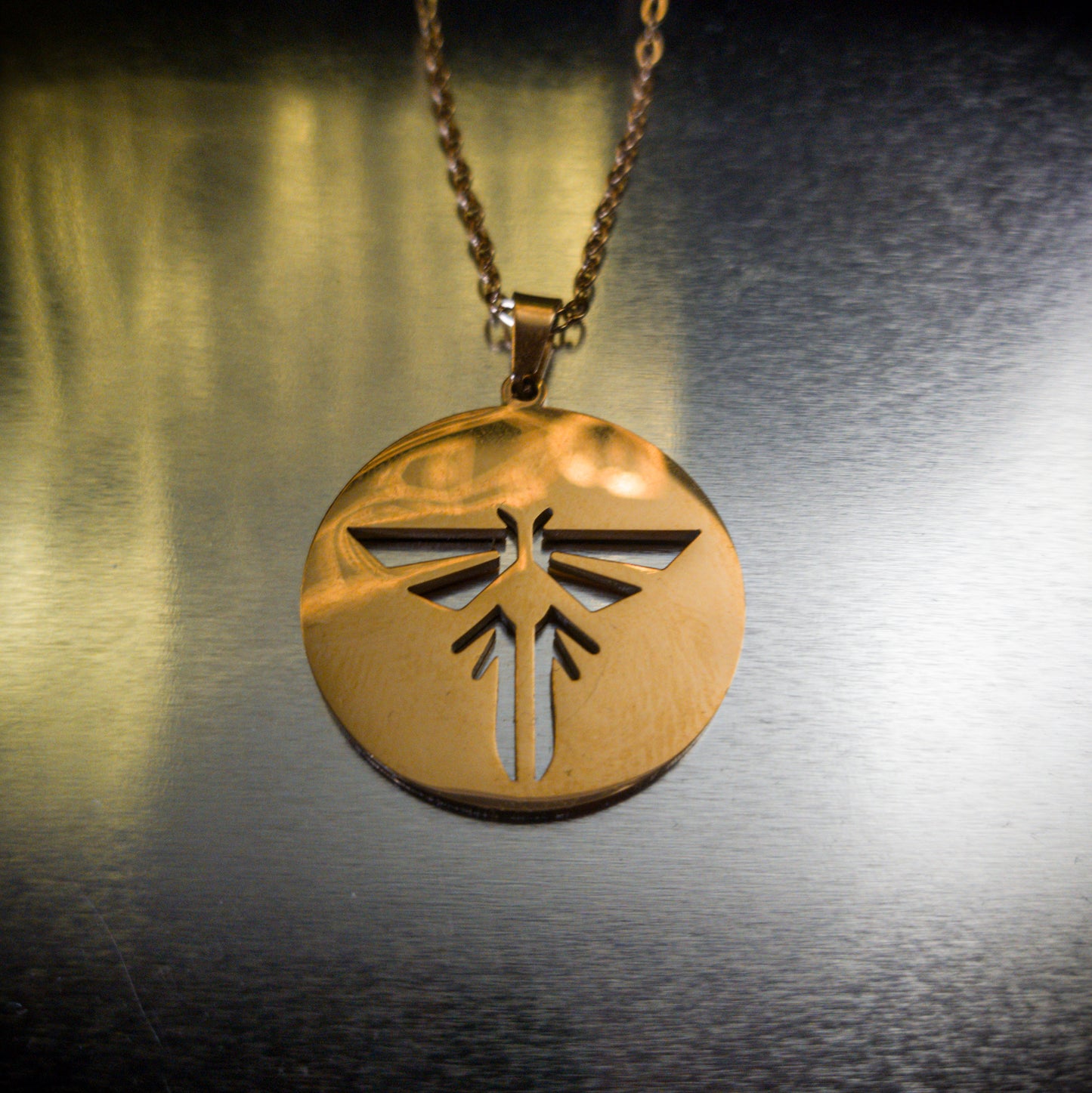 The Last of Us Stainless Steel Firefly Necklace - Gold Available at 2Fast2See.co