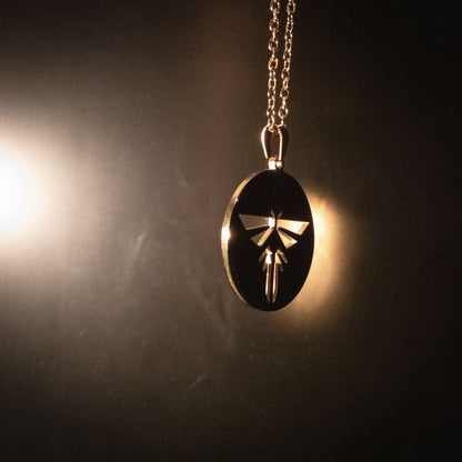 The Last of Us Premium Gold Firefly Necklace - Gold Available at 2Fast2See.co