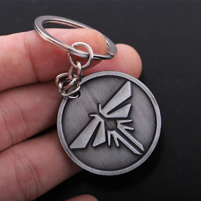 The Last of Us Firefly Keychain - Available at 2Fast2See.co