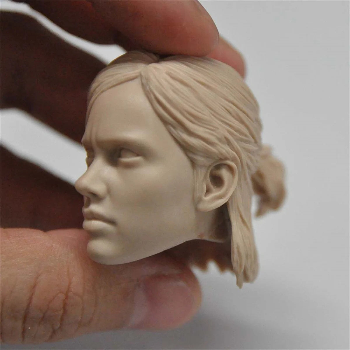 The Last of Us Ellie's Unpanited Carved Head Fits on Pencil - Available at 2Fast2See.co