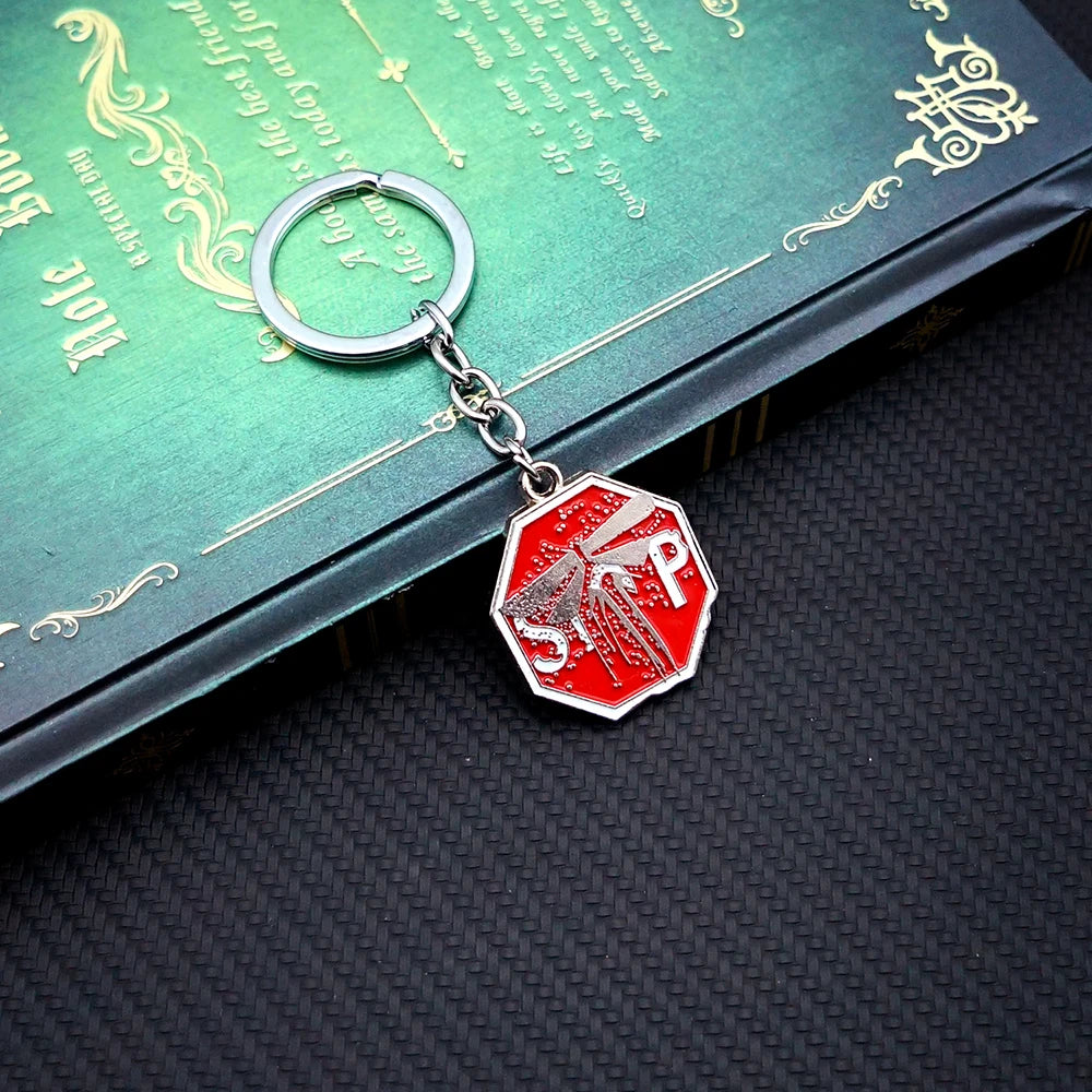 The Last of Us Firefly Metal Keychain - Firefly Metal Keychain Available at 2Fast2See.co