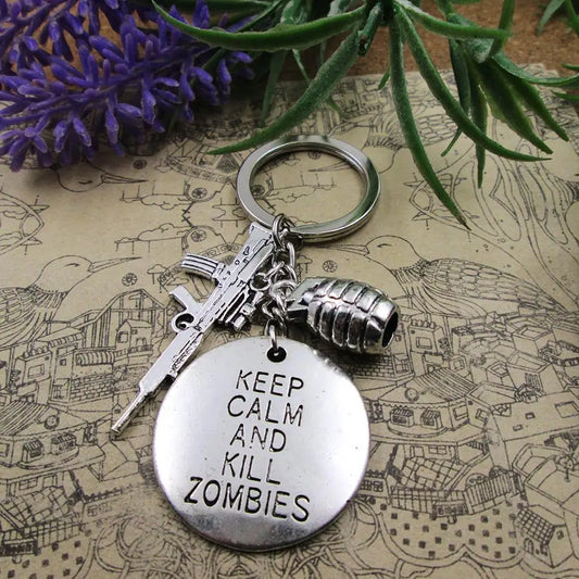 Keep Calm And Kill Zombies Gun & Grenade Charm Keyring - Default Title Available at 2Fast2See.co