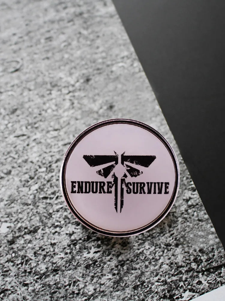 The Last of Us Endure and Survive Firefly Pin - Available at 2Fast2See.co