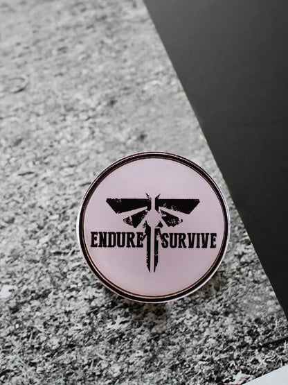 The Last of Us Endure and Survive Firefly Pin - Available at 2Fast2See.co